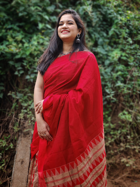 Stunning red cotton saree with muga coloured pallu and pleats handwoven with arnai motifs handcrafted for the beautiful you.