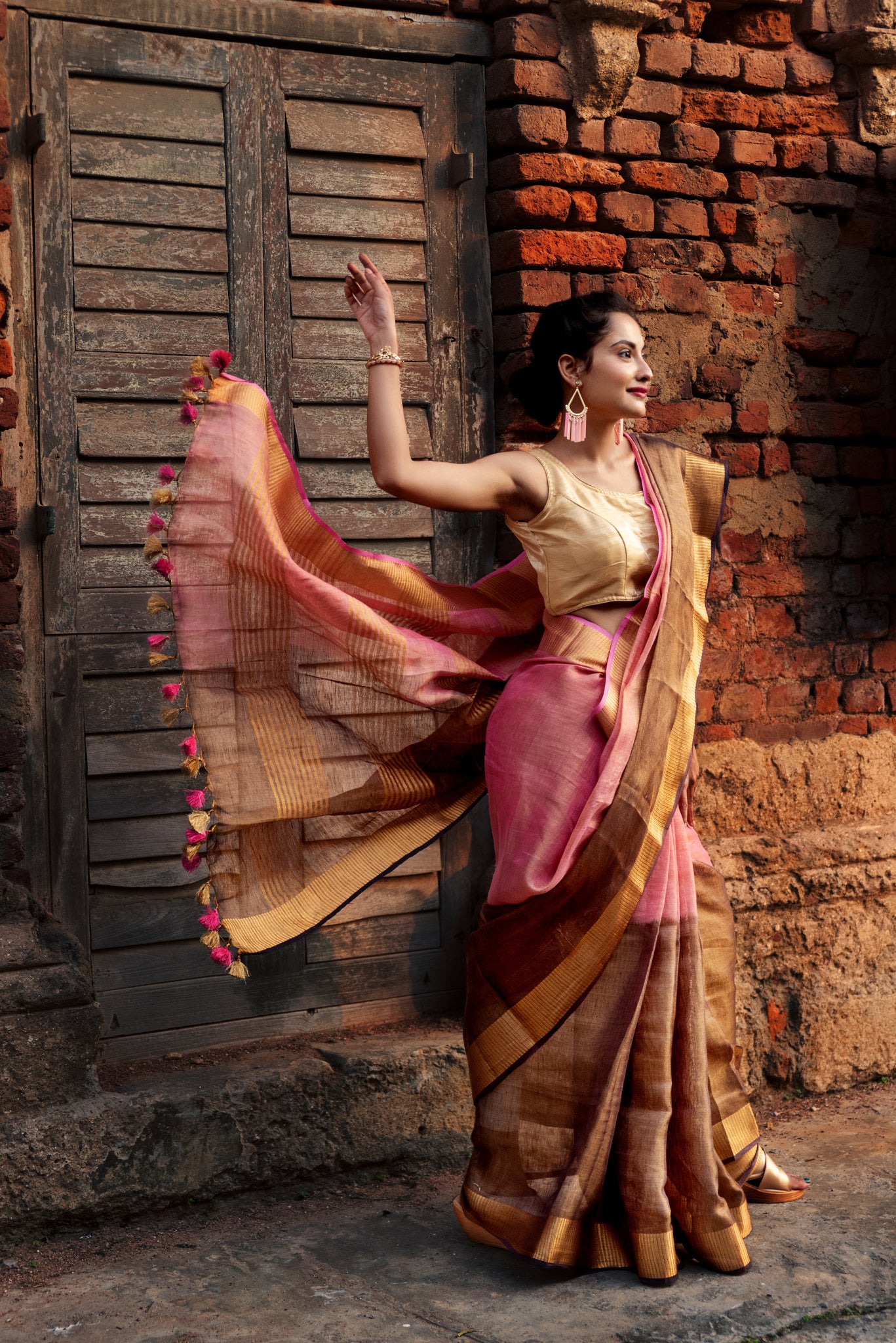 Brown and pink tissue linen saree for women with soft shimmer